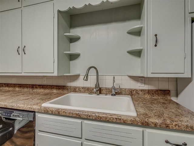 901 S 11th St, Kingfisher, OK 73750 - kitchen with open shelves, dishwasher, white cabinets, and backsplash