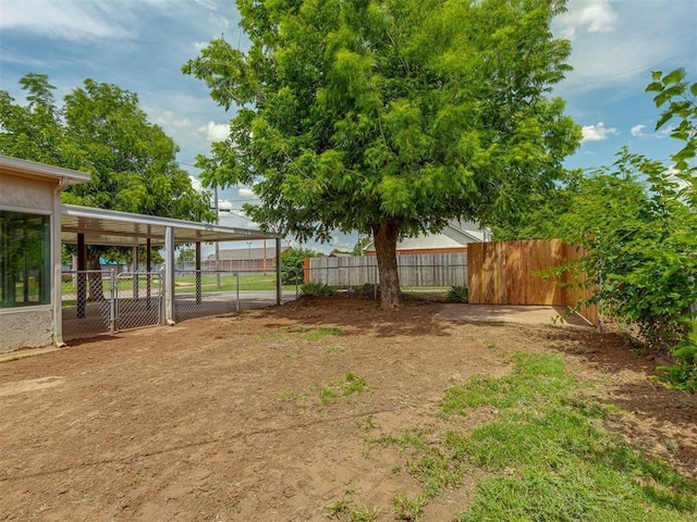 901 S 11th St, Kingfisher, OK 73750 - view of yard with a carport