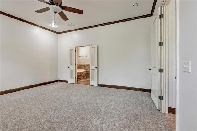 5000 Tower Bridge Court, Edmond, OK 73034 - spare room featuring crown molding, light colored carpet, and a ceiling fan