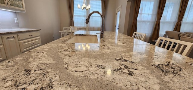 821 Mount Irving Way, Norman, OK 73071 - dining area view of tasteful backsplash and a chandelier