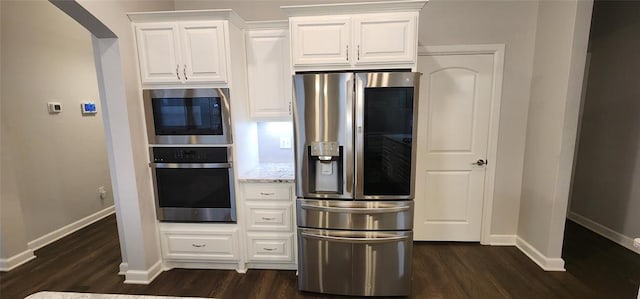 821 Mount Irving Way, Norman, OK 73071 - kitchen featuring stainless steel appliances, dark wood finished floors, white cabinets, and light stone countertops