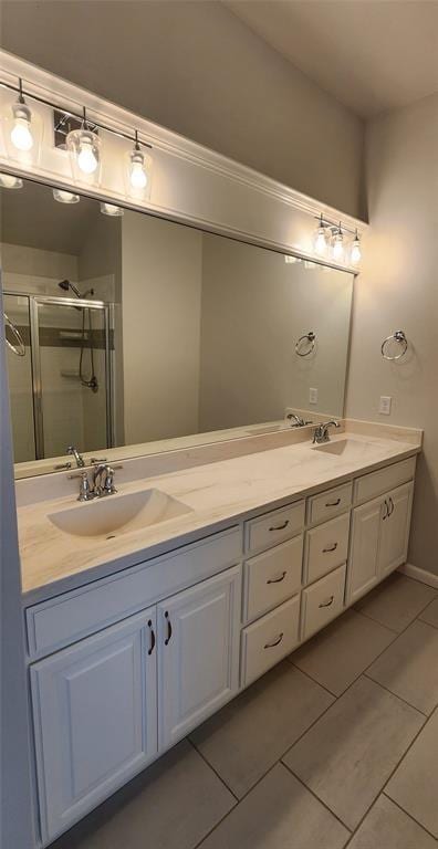 821 Mount Irving Way, Norman, OK 73071 - full bath featuring double vanity, a shower stall, and tile patterned floors