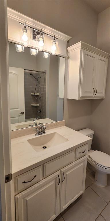 821 Mount Irving Way, Norman, OK 73071 - full bathroom with a shower, vanity, and tile patterned flooring