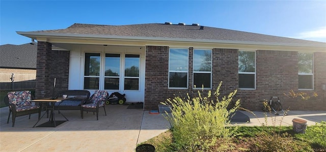 821 Mount Irving Way, Norman, OK 73071 - rear view of house featuring a patio area and brick siding