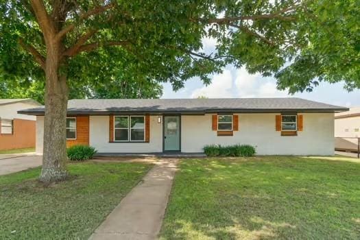 107 Cimarron Ter, Cashion, OK 73016 - single story home with a front yard and stucco siding