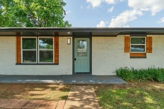 107 Cimarron Ter, Cashion, OK 73016 - view of exterior entry