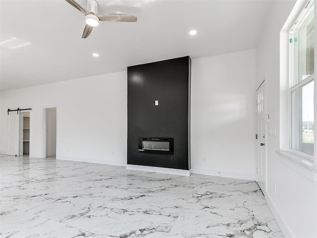 532 NW 112th St, Oklahoma City, OK 73114 - unfurnished living room with light marble finish floors, ceiling fan, recessed lighting, a barn door, and heating unit