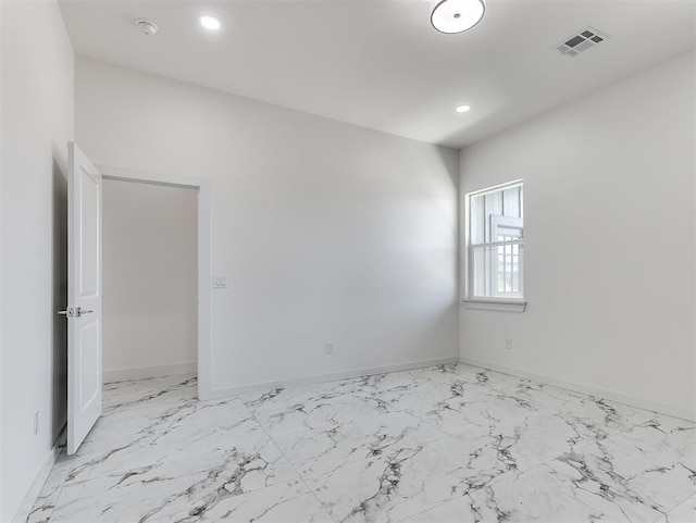 532 NW 112th St, Oklahoma City, OK 73114 - unfurnished room with light marble finish floors and recessed lighting