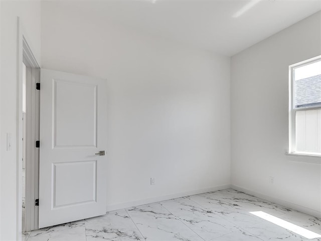 532 NW 112th St, Oklahoma City, OK 73114 - unfurnished room with light marble finish floors