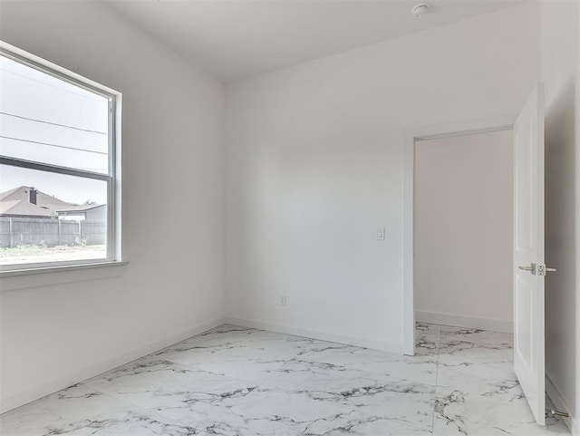 532 NW 112th St, Oklahoma City, OK 73114 - spare room with light marble finish floors and a smoke detector