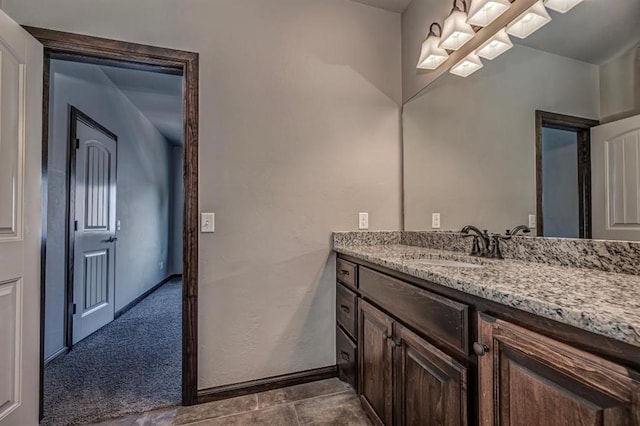 3205 Sycamore Dr, Moore, OK 73160 - bathroom featuring vanity and baseboards