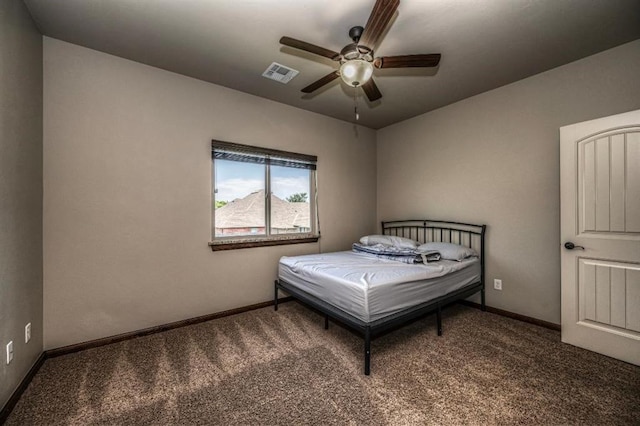 3205 Sycamore Dr, Moore, OK 73160 - bedroom featuring carpet flooring and ceiling fan