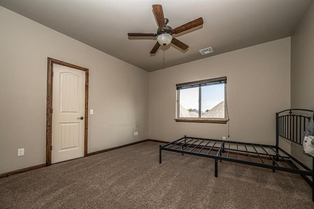 3205 Sycamore Dr, Moore, OK 73160 - unfurnished bedroom featuring carpet flooring and baseboards