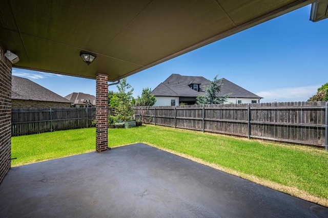 3205 Sycamore Dr, Moore, OK 73160 - fenced backyard with a patio