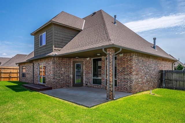 3205 Sycamore Dr, Moore, OK 73160 - back of house featuring brick siding, a patio, and a shingled roof