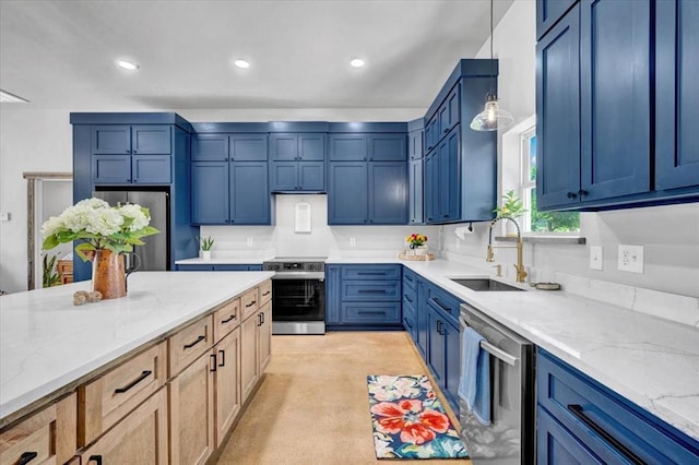 831 County St Unit 2917, Tuttle, OK 73089 - kitchen with appliances with stainless steel finishes, light stone countertops, recessed lighting, blue cabinets, and decorative light fixtures