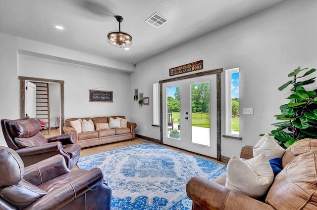 831 County St Unit 2917, Tuttle, OK 73089 - living room with french doors and recessed lighting