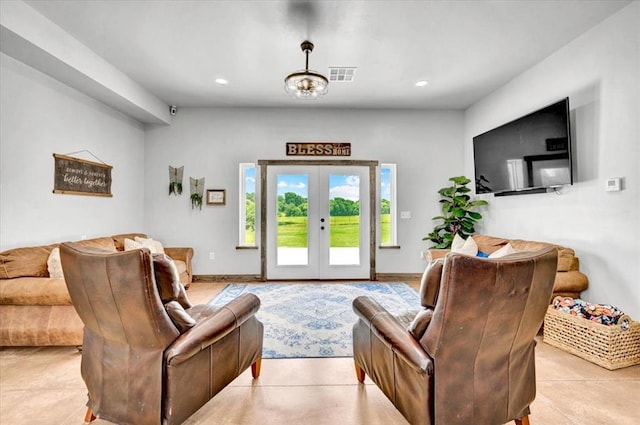 831 County St Unit 2917, Tuttle, OK 73089 - living room featuring french doors and recessed lighting