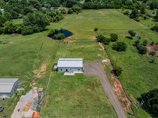 831 County St Unit 2917, Tuttle, OK 73089 - aerial overview of property's location featuring rural landscape and a nearby body of water
