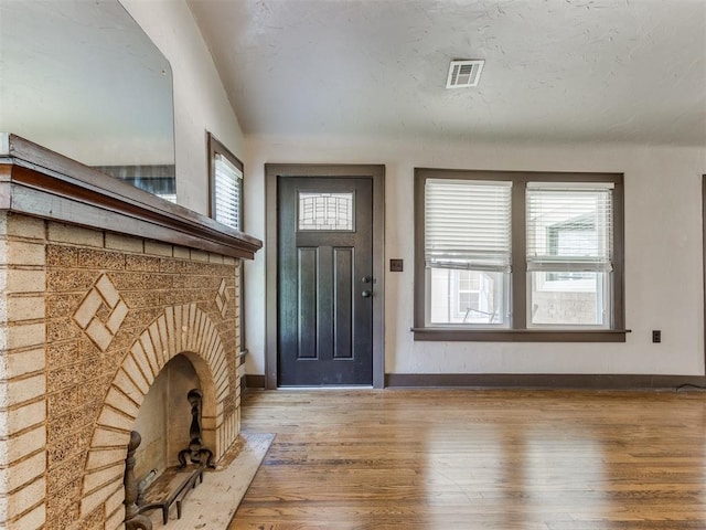 2420 NW 21st St, Oklahoma City, OK 73107 - foyer with wood finished floors and plenty of natural light