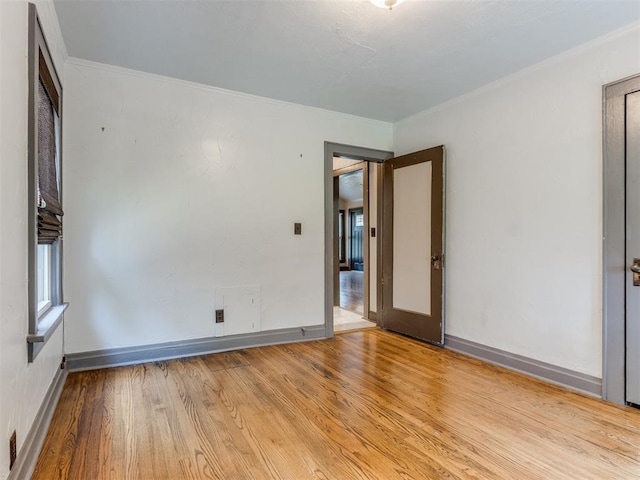 2420 NW 21st St, Oklahoma City, OK 73107 - unfurnished room featuring wood finished floors and crown molding
