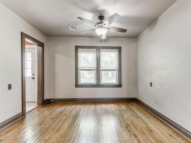 2420 NW 21st St, Oklahoma City, OK 73107 - unfurnished room featuring light wood-style flooring and a ceiling fan