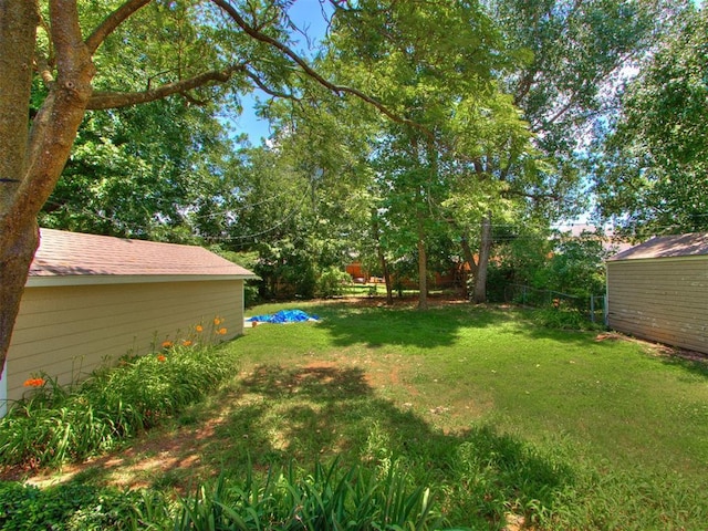 2420 NW 21st St, Oklahoma City, OK 73107 - view of yard featuring an outbuilding