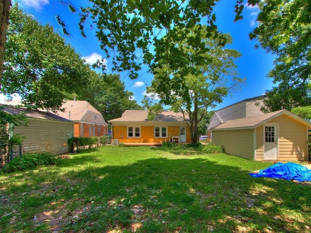 2420 NW 21st St, Oklahoma City, OK 73107 - view of green lawn with an outbuilding