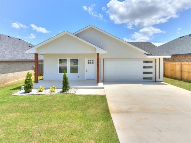 426 NW 115th St, Oklahoma City, OK 73114 - view of front of property featuring an attached garage, a porch, concrete driveway, and stucco siding