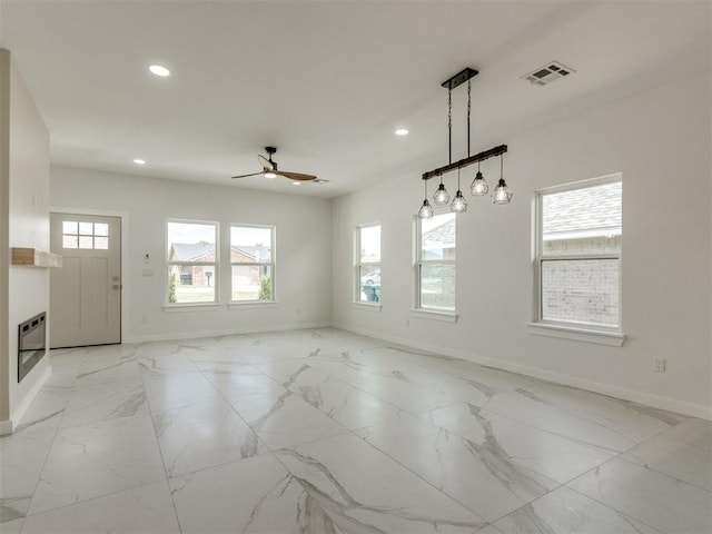426 NW 115th St, Oklahoma City, OK 73114 - spare room with recessed lighting, ceiling fan, and light marble finish floors