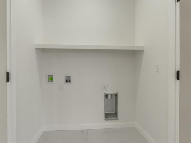 426 NW 115th St, Oklahoma City, OK 73114 - laundry area featuring hookup for a washing machine, marble look tile flooring, and electric dryer hookup