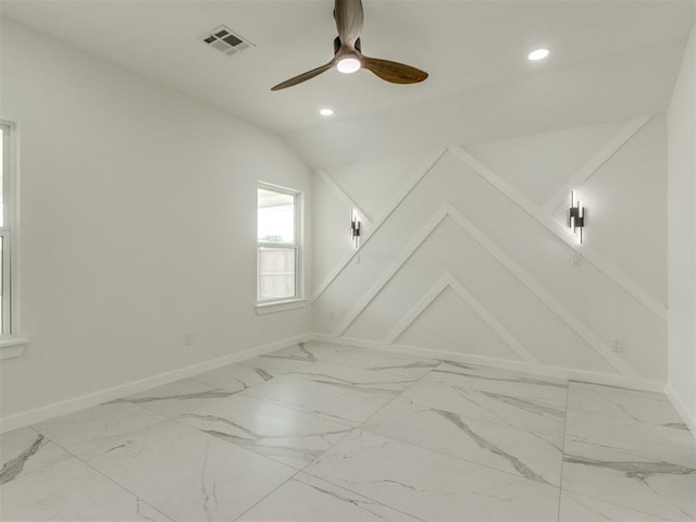 426 NW 115th St, Oklahoma City, OK 73114 - unfurnished room featuring recessed lighting, lofted ceiling, ceiling fan, and light marble finish flooring