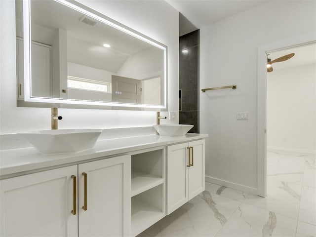 426 NW 115th St, Oklahoma City, OK 73114 - full bathroom with double vanity and marble finish flooring
