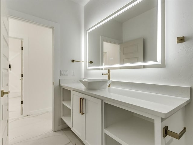 426 NW 115th St, Oklahoma City, OK 73114 - bathroom featuring marble finish flooring and vanity