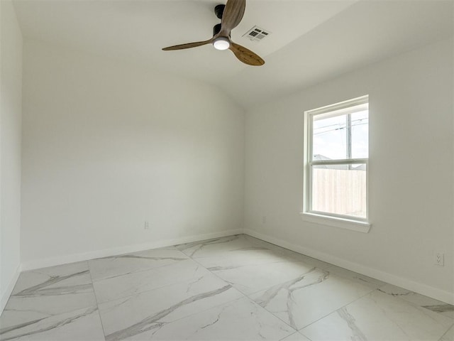 426 NW 115th St, Oklahoma City, OK 73114 - unfurnished room featuring a ceiling fan, marble look tile flooring, and lofted ceiling