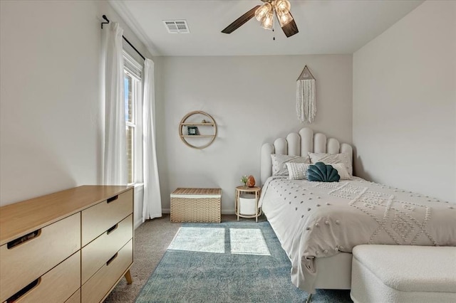 6605 NW 147th St, Oklahoma City, OK 73013 - carpeted bedroom with ceiling fan and baseboards