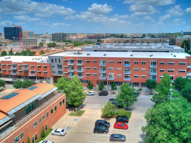 1 NE 2nd St Unit 309, Oklahoma City, OK 73104 - view of apartment building / complex with uncovered parking and a view of city