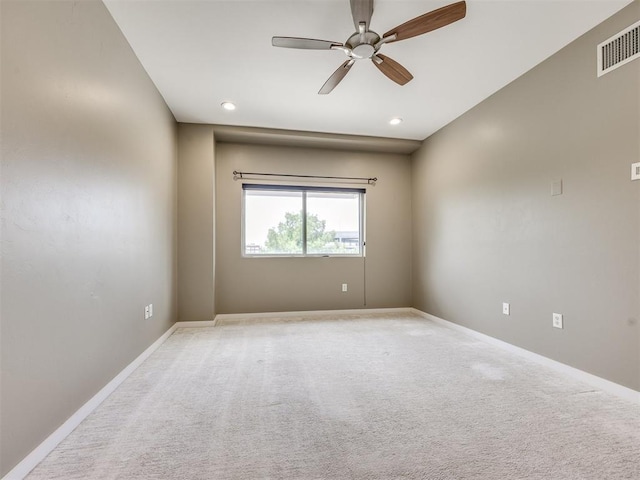 1 NE 2nd St Unit 309, Oklahoma City, OK 73104 - spare room with a ceiling fan, light colored carpet, and recessed lighting