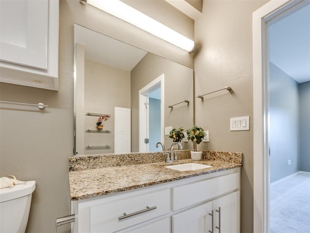 1 NE 2nd St Unit 309, Oklahoma City, OK 73104 - bathroom featuring vanity and toilet