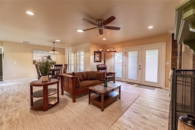 1600 Turtlecreek Rd, Edmond, OK 73013 - living area with light wood-style floors, a ceiling fan, recessed lighting, and french doors