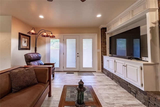 1600 Turtlecreek Rd, Edmond, OK 73013 - living room featuring recessed lighting, french doors, and light wood finished floors