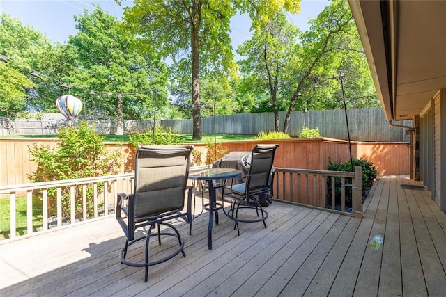 1600 Turtlecreek Rd, Edmond, OK 73013 - deck featuring a fenced backyard and outdoor dining area