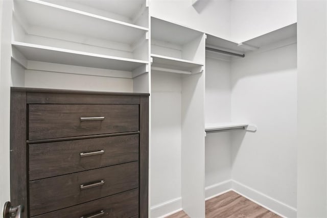 810 S Lahoma Ave, Norman, OK 73069 - walk in closet with wood finished floors