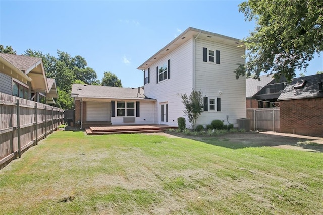 810 S Lahoma Ave, Norman, OK 73069 - rear view of property with a fenced backyard and a deck