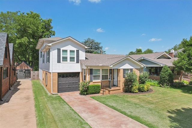 810 S Lahoma Ave, Norman, OK 73069 - split level home with brick siding, concrete driveway, and an attached garage