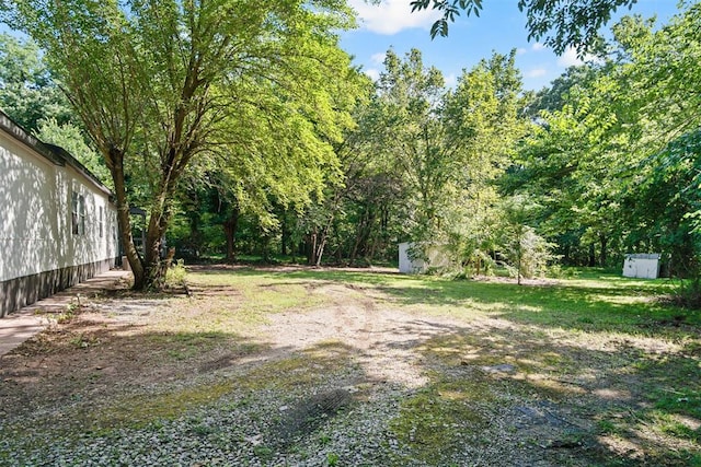 3334 N 9th Ave, Purcell, OK 73080 - view of yard with a storage unit