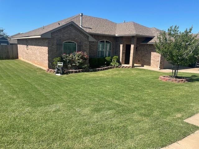 11820 SW 8th St, Yukon, OK 73099 - back of house featuring brick siding and a shingled roof