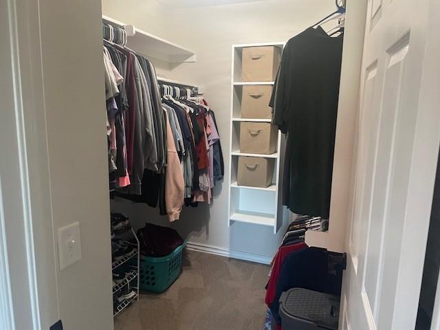 11820 SW 8th St, Yukon, OK 73099 - walk in closet featuring carpet