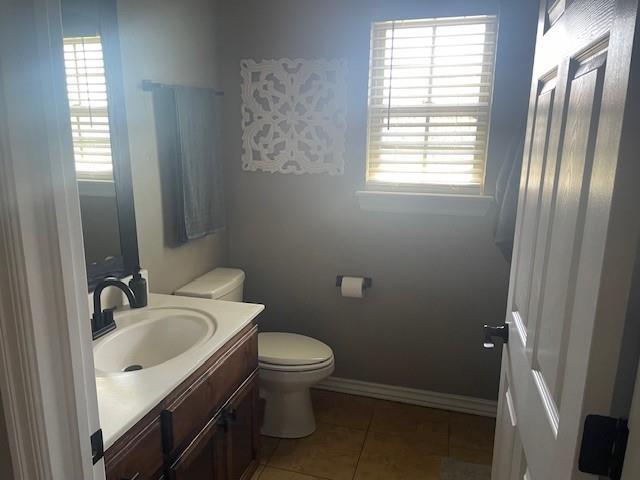 11820 SW 8th St, Yukon, OK 73099 - bathroom with vanity and tile patterned floors