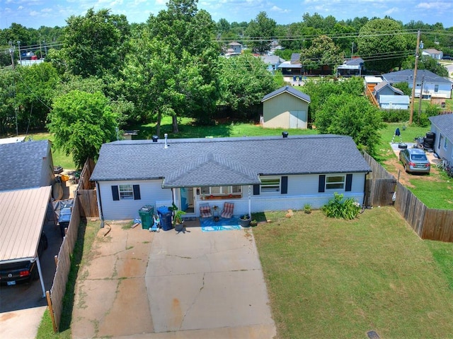 5305 S Drexel Ave, Oklahoma City, OK 73119 - view of front of property with a fenced backyard and roof with shingles